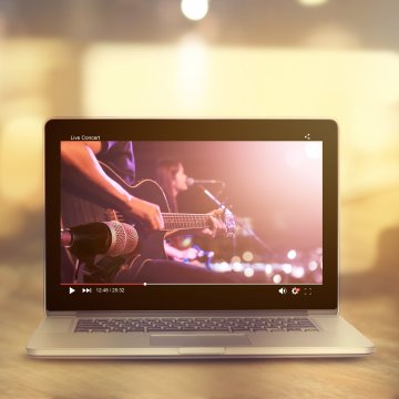 laptop website web hosting music website band playing concert live